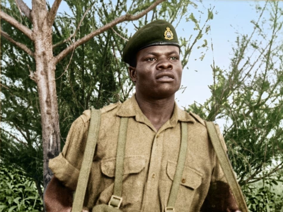 In beret, on active service